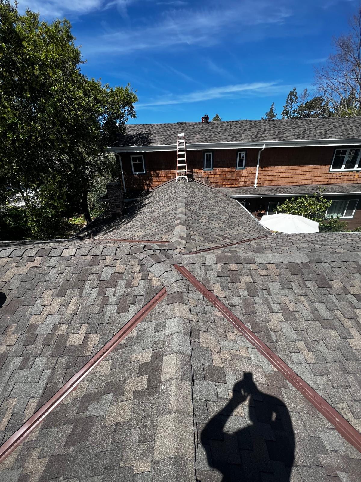 Brown Shingle Reroof with Copper Valley Flashing