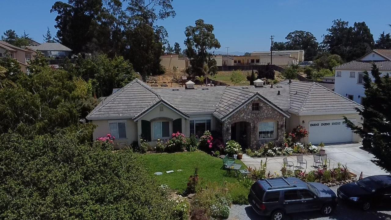 Gray Concrete Tile Roof on a Stone-Accent Home
